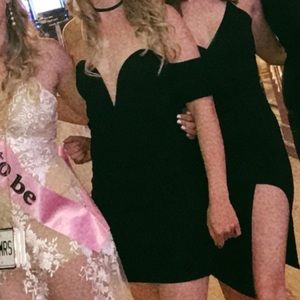 Black off the shoulder low cut dress